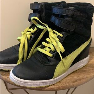 Puma high top wedge tennis shoes